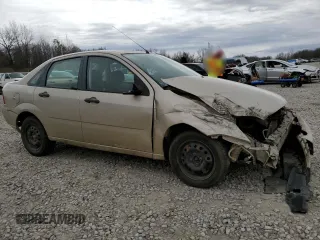 2007 Ford Focus S with VIN 1FAFP34N07W242359, listed as a Copart auction lot 61677025 with 164,445 mi miles and Salvage title. Bid and sale history available at DreamBid. Image 4.