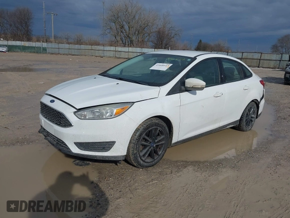 2016 Ford Focus SE z VIN 1FADP3F23GL343651, wystawiony jako IAAI lot #41668112 z przebiegiem 120 891 mil mil oraz . Historia ofert i sprzedaży dostępna na DreamBid. Obrazek 18.