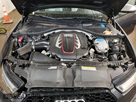 2016 Audi S6 Premium Plus z VIN WAUF2AFC4GN100284, wystawiony jako Copart lot #86496964 z przebiegiem 100 537 mil mil oraz Szkody całkowita. Historia ofert i sprzedaży dostępna na DreamBid. Obrazek 13.