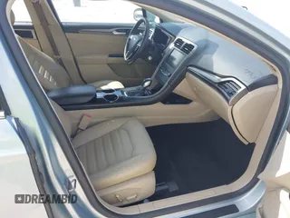 2013 Ford Fusion SE Hybrid z VIN 3FA6P0LU8DR265460, wystawiony jako IAAI lot #42720385 z przebiegiem 146 179 mil mil oraz . Historia ofert i sprzedaży dostępna na DreamBid. Obrazek 5.
