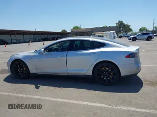 2013 Tesla Model S with VIN 5YJSA1CN5DFP11381, listed as a IAAI auction lot 42087803 with 146,818 mi miles and . Bid and sale history available at DreamBid. Image 13.