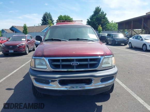 1998 Ford F-150 with VIN 1FTZF182XWKA36602, listed as a IAAI auction lot 42472442 with 112,235 mi miles and . Bid and sale history available at DreamBid. Image 12.