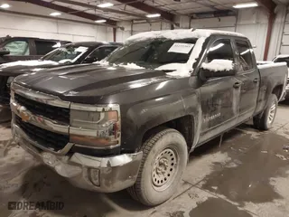2016 Chevrolet Silverado 1500 LT with VIN 1GCRCREC8GZ137747, listed as a IAAI auction lot 41235393 with 158,487 mi miles. Bid and sale history available at carsss.com. Image 2.