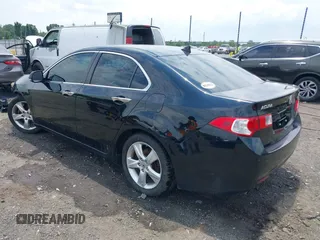 2009 Acura TSX with VIN JH4CU266X9C021120, listed as a IAAI auction lot 42397074 with 124,615 mi miles and . Bid and sale history available at DreamBid. Image 3.