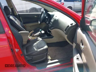 2009 Hyundai Elantra Touring z VIN KMHDC86E59U037556, wystawiony jako IAAI lot #41525627 z przebiegiem 253 875 mil mil oraz . Historia ofert i sprzedaży dostępna na DreamBid. Obrazek 5.