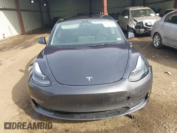2023 Tesla Model 3 with VIN 5YJ3E1EA6PF567170, listed as a IAAI auction lot 41837040 with 36,193 mi miles and . Bid and sale history available at DreamBid. Image 12.