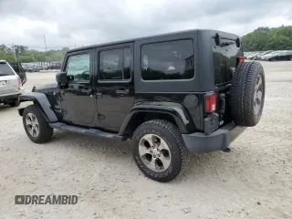 2018 Jeep Wrangler JK Unlimited Sahara with VIN 1C4HJWEG3JL921167, listed as a Copart auction lot 57310714 with 59,110 mi miles and Salvage Title. Bid and sale history available at carsss.com. Image 2.