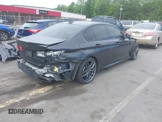 2018 BMW 5 Series M550i xDrive with VIN WBAJB9C56JB035364, listed as a IAAI auction lot 42179145 with 112,123 mi miles and . Bid and sale history available at DreamBid. Image 4.