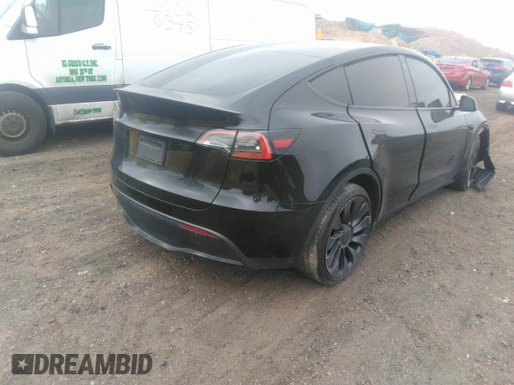 2022 Tesla Model Y Performance with VIN 7SAYGDEF6NF530388, listed as a IAAI auction lot 39253462 with 21,393 mi miles and . Bid and sale history available at DreamBid. Image 4.