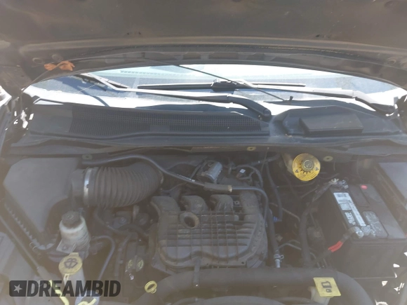 2014 Dodge Grand Caravan SXT with VIN 2C4RDGCG2ER313531, listed as a IAAI auction lot 42221726 with 177,065 mi miles and . Bid and sale history available at DreamBid. Image 10.