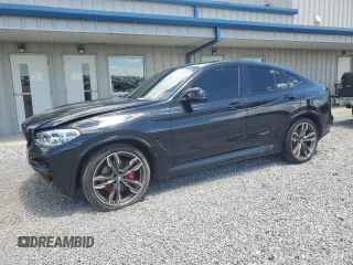 2021 BMW X4 M40i with VIN 5UX2V5C02M9G87889, listed as a Copart auction lot 57698915 with 51,520 mi miles and Salvage title. Bid and sale history available at DreamBid. Image 1.