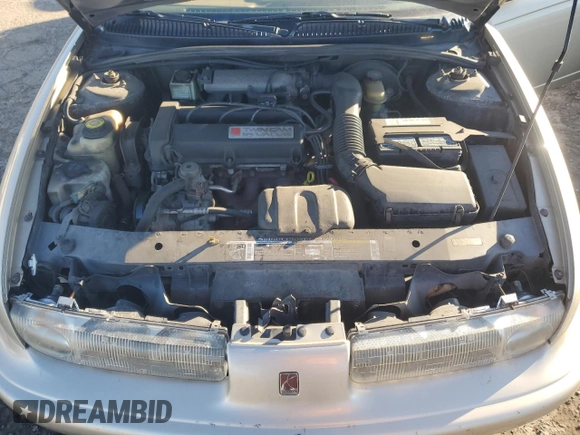 1999 Saturn SL with VIN 1G8ZK5270XZ147170, listed as a Copart auction lot 42169385 with 141,100 mi miles and Clean title. Bid and sale history available at DreamBid. Image 11.
