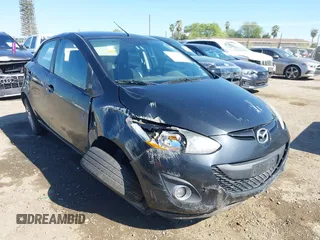 2014 Mazda 2 Touring with VIN JM1DE1LY0E0175771, listed as a IAAI auction lot 41866966 with 90,774 mi miles. Bid and sale history available at carsss.com. Image 1.