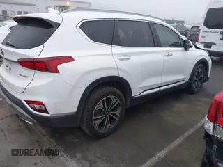 2019 Hyundai Santa Fe Ultimate with VIN 5NMS5CAA3KH036089, listed as a IAAI auction lot 40810710 with 62,561 mi miles and . Bid and sale history available at DreamBid. Image 4.