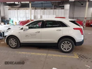 2017 Cadillac XT5 FWD with VIN 1GYKNARS7HZ121596, listed as a IAAI auction lot 41825879 with 82,023 mi miles and . Bid and sale history available at DreamBid. Image 15.