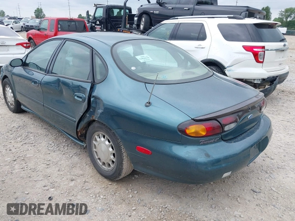1996 Ford Taurus LX with VIN 1FALP53S3TG177324, listed as a IAAI auction lot 42622520 with 126,979 mi miles and . Bid and sale history available at DreamBid. Image 3.