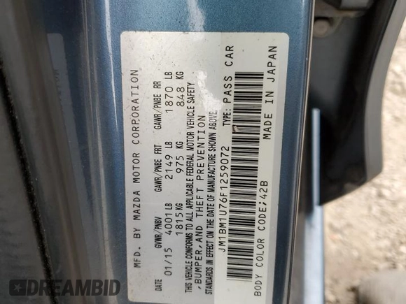 2015 Mazda 3 i Sport z VIN JM1BM1U76F1259072, wystawiony jako Copart lot #53812045 z przebiegiem 41 455 mil mil oraz Szkoda całkowita • Salvage title. Historia ofert i sprzedaży dostępna na DreamBid. Obrazek 13.