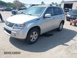 2012 Suzuki Grand Vitara Premium z VIN JS3TD0D61C4100526, wystawiony jako IAAI lot #42526106 z przebiegiem 267 906 mil mil oraz . Historia ofert i sprzedaży dostępna na DreamBid. Obrazek 2.