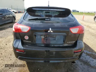 2009 Mitsubishi Lancer z VIN JA3AX88W99U613116, wystawiony jako Copart lot #58765855 z przebiegiem 256 289 mil mil oraz Czysty tytuł • Clean title. Historia ofert i sprzedaży dostępna na DreamBid. Obrazek 6.
