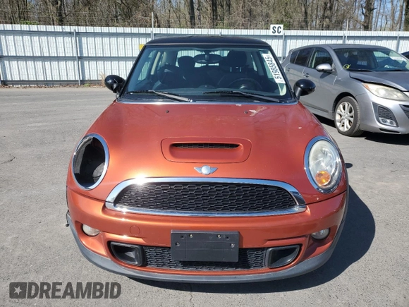 2011 MINI Hardtop S with VIN WMWSV3C57BTY11831, listed as a Copart auction lot 51985845 with 70,690 mi miles and Salvage Title. Bid and sale history available at DreamBid. Image 5.
