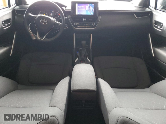 2023 Toyota Corolla Cross LE with VIN 7MUCAAAG6PV046568, listed as a Copart auction lot 56658195 with 30,482 mi miles and Non repairable. Bid and sale history available at DreamBid. Image 8.