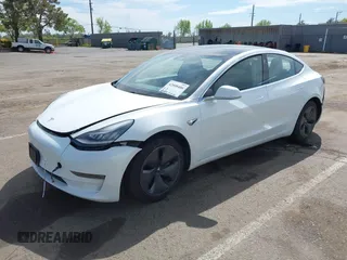 2018 Tesla Model 3 Long Range Battery with VIN 5YJ3E1EA2JF023370, listed as a IAAI auction lot 42008406 with 163,474 mi miles and . Bid and sale history available at DreamBid. Image 2.