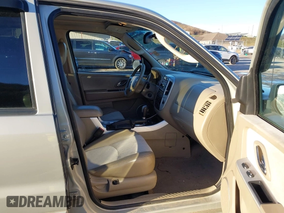 2006 Mercury Mariner Luxury с VIN 4M2YU571X6DJ08480, выставлен на аукционе IAAI как лот 41094486 с пробегом 138 138 миль миль и . История ставок и продаж доступна на DreamBid. Изображение 5.