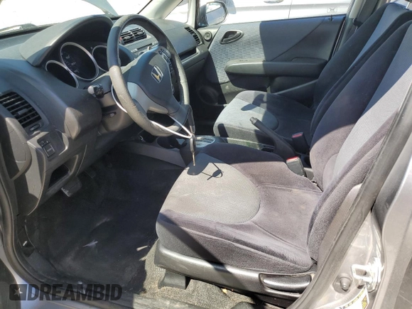 2007 Honda Fit Sport with VIN JHMGD38637S041653, listed as a Copart auction lot 48224085 with 121,493 mi miles and Salvage Title. Bid and sale history available at carsss.com. Image 7.