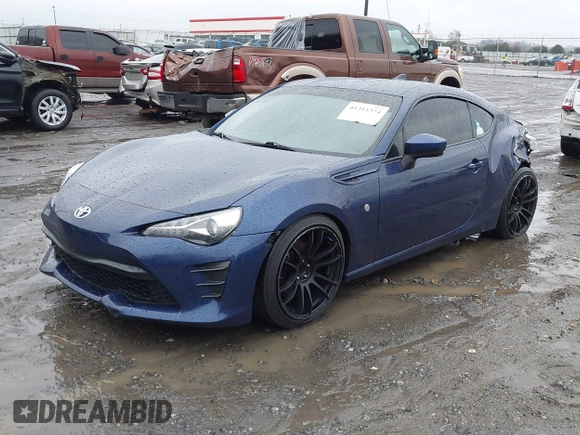 2017 Toyota 86 with VIN JF1ZNAA12H9703408, listed as a IAAI auction lot 41311374 with 90,661 mi miles. Bid and sale history available at carsss.com. Image 2.