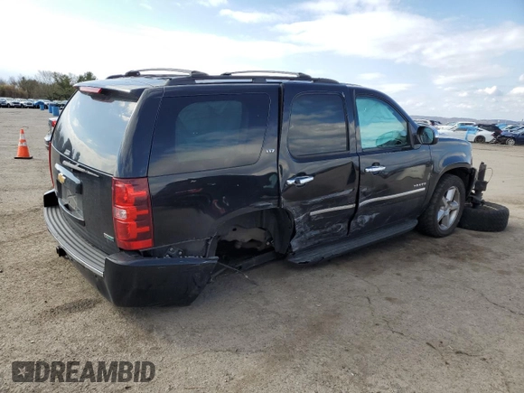 2012 Chevrolet Tahoe LTZ with VIN 1GNSKCE08CR322969, listed as a Copart auction lot 50604555 with 165,190 mi miles and Salvage title. Bid and sale history available at DreamBid. Image 3.