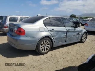 2007 BMW 3 Series 328i with VIN WBAVC53547FZ71265, listed as a Copart auction lot 54000075 with 130,559 mi miles and Salvage title. Bid and sale history available at DreamBid. Image 3.