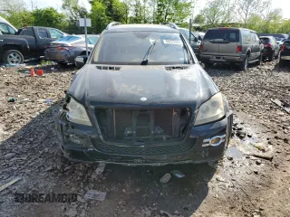 2009 Mercedes-Benz GL 550 z VIN 4JGBF86E49A501002, wystawiony jako Copart lot #56225565 z przebiegiem 168 098 mil mil oraz Szkody całkowita. Historia ofert i sprzedaży dostępna na DreamBid. Obrazek 5.