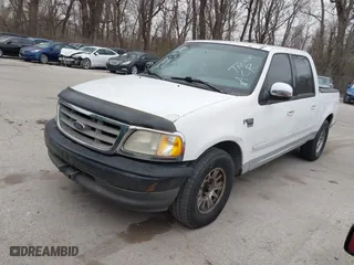 2001 Ford F-150 SuperCrew XLT with VIN 1FTRW07L61KB49220, listed as a IAAI auction lot 41826223 with 281,547 mi miles. Bid and sale history available at carsss.com. Image 2.