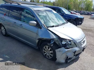 2010 Honda Odyssey EX-L with VIN 5FNRL3H74AB046578, listed as a IAAI auction lot 42049213 with 218,457 mi miles. Bid and sale history available at carsss.com. Image 6.