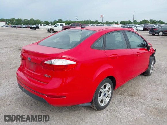 2015 Ford Fiesta SE with VIN 3FADP4BJ9FM129246, listed as a IAAI auction lot 42177812 with 87,925 mi miles. Bid and sale history available at carsss.com. Image 4.