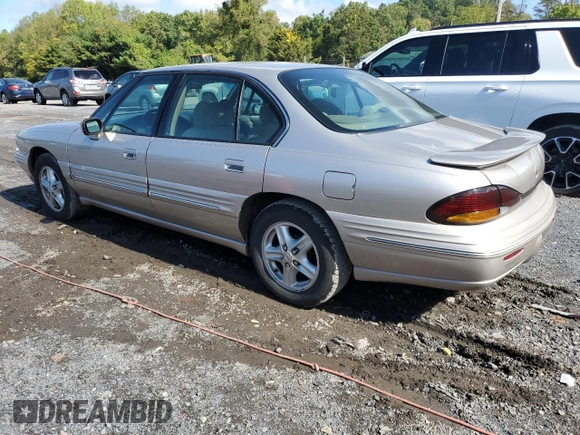 1997 Pontiac Bonneville SE z VIN 1G2HX52K7VH211607, wystawiony jako Copart lot #73705454 z przebiegiem 116 307 mil mil oraz Szkoda całkowita • Salvage title. Historia ofert i sprzedaży dostępna na DreamBid. Obrazek 2.
