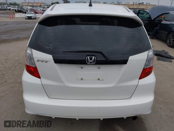 2009 Honda Fit Sport with VIN JHMGE88409S021730, listed as a IAAI auction lot 42045023 with 309,995 mi miles. Bid and sale history available at carsss.com. Image 16.