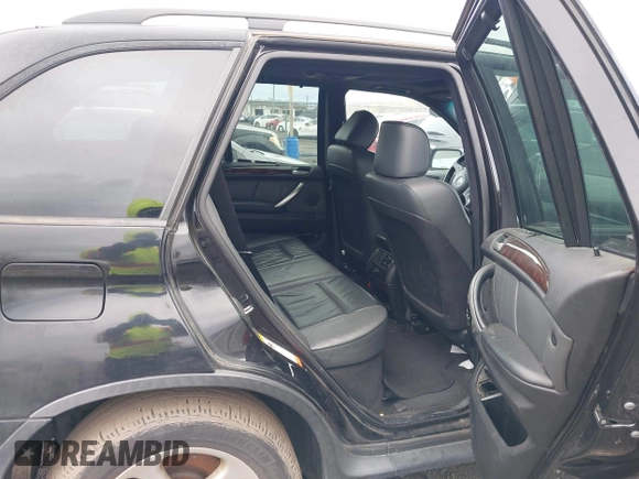 2001 BMW X5 3.0i with VIN WBAFA53501LM71185, listed as a IAAI auction lot 41610473 with 141,322 mi miles. Bid and sale history available at carsss.com. Image 8.