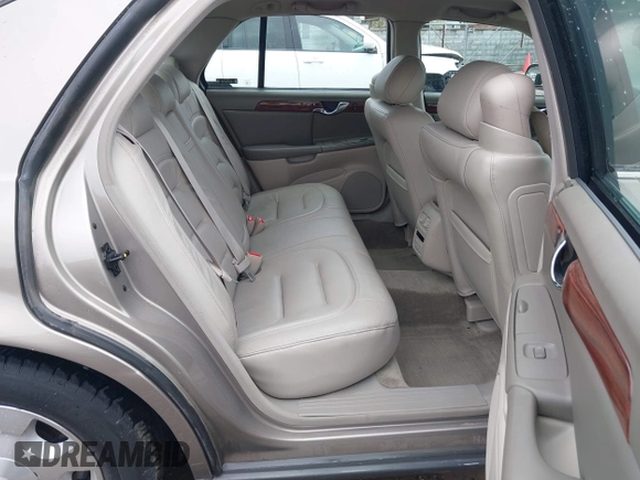 2002 Cadillac DeVille z VIN 1G6KD54Y32U108623, wystawiony jako IAAI lot #41957171 z przebiegiem 136 941 mil mil oraz . Historia ofert i sprzedaży dostępna na DreamBid. Obrazek 8.