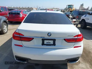 2019 BMW 7 Series 750i with VIN WBA7F0C5XKGM25771, listed as a IAAI auction lot 42167614 with 73,692 mi miles. Bid and sale history available at carsss.com. Image 16.