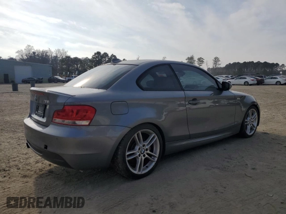 2012 BMW 1 Series 135i with VIN WBAUC9C56CVM12237, listed as a Copart auction lot 85595234 with Not provided miles and Salvage title. Bid and sale history available at DreamBid. Image 3.
