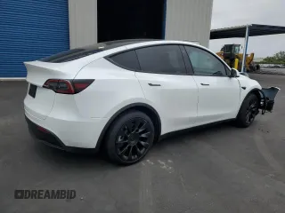 2023 Tesla Model Y Long Range with VIN 7SAYGDEEXPF744472, listed as a Copart auction lot 54109315 with 15,404 mi miles and Salvage Title. Bid and sale history available at DreamBid. Image 3.