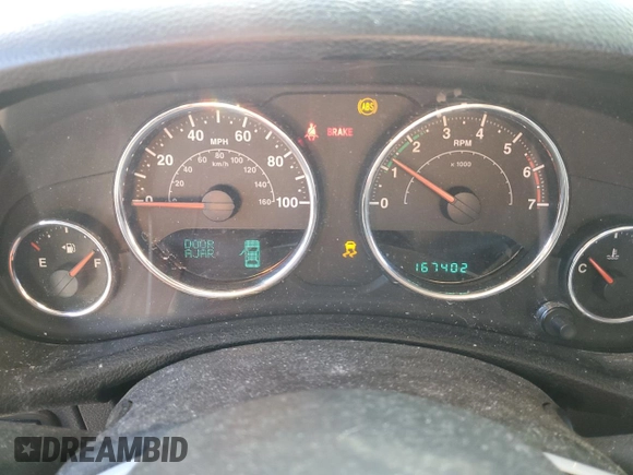 2011 Jeep Wrangler Rubicon with VIN 1J4BA6D10BL502188, listed as a Copart auction lot 86800444 with 167,402 mi miles and Non Repairable. Bid and sale history available at carsss.com. Image 9.