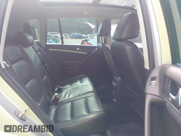 2013 Volkswagen Tiguan S with VIN WVGAV3AX9DW566269, listed as a IAAI auction lot 42728301 with 159,903 mi miles and . Bid and sale history available at DreamBid. Image 8.