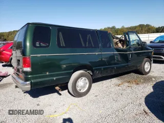 1999 Ford Econoline Passenger XL with VIN 1FBSS31L0XHB12679, listed as a Copart auction lot 74257504 with 136,821 mi miles and Salvage Title. Bid and sale history available at DreamBid. Image 3.
