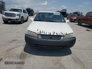 1998 Toyota Camry LE z VIN JT2BG22K9W0145537, wystawiony jako Copart lot #59018505 z przebiegiem 301 595 mil mil oraz Czysty tytuł • Clean title. Historia ofert i sprzedaży dostępna na DreamBid. Obrazek 5.