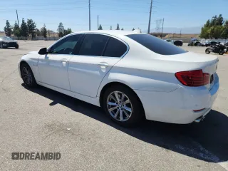 2015 BMW 5 Series 528i with VIN WBA5A5C59FD518341, listed as a Copart auction lot 63881785 with 147,489 mi miles and Salvage title. Bid and sale history available at DreamBid. Image 2.