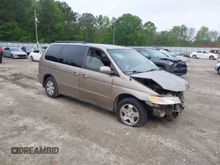 2003 Honda Odyssey EX z VIN 2HKRL18683H505577, wystawiony jako IAAI lot #42118231 z przebiegiem 234 329 mil mil oraz . Historia ofert i sprzedaży dostępna na DreamBid. Obrazek 1.