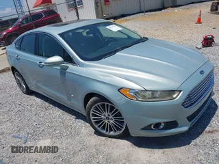 2013 Ford Fusion SE Hybrid z VIN 3FA6P0LU4DR259073, wystawiony jako IAAI lot #42197143 z przebiegiem 87 337 mil mil oraz . Historia ofert i sprzedaży dostępna na DreamBid. Obrazek 1.