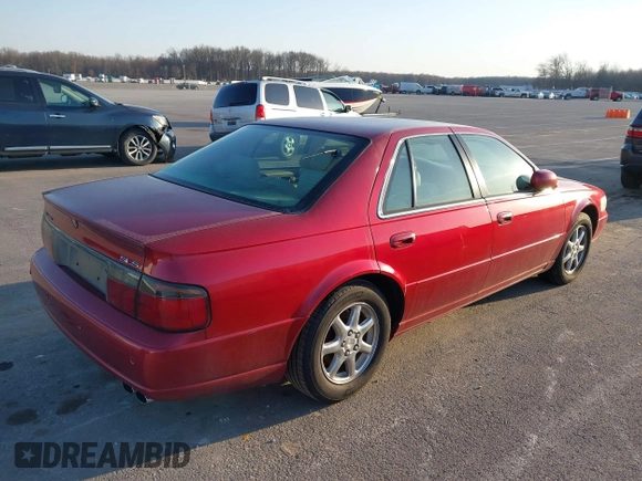 2003 Cadillac Seville Luxury SLS z VIN 1G6KS54Y33U252938, wystawiony jako IAAI lot #41767653 z przebiegiem 145 346 mil mil oraz . Historia ofert i sprzedaży dostępna na DreamBid. Obrazek 4.